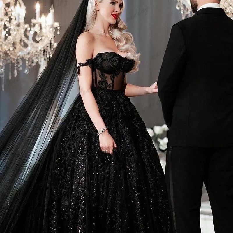 Black Gothic Sequined Plus Size A Line Wedding Dress illusion Off Shoulder Lace Appliques Formal Dress Bridal Gowns
Black Gothic Sequined Plus Size A Line Wedding Dress illusion Off Shoulder Lace Appliques Formal Dress Bridal Gowns