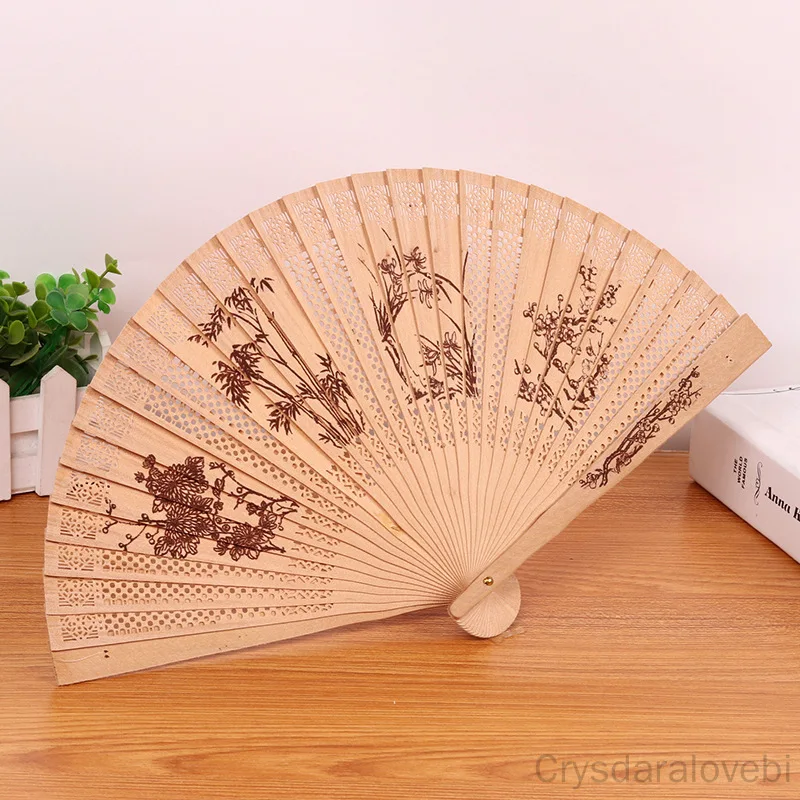 Retro Wooden Hollow Fan Chinese Style Wooden Handle Folding Fan Landscape Painting Decorative Fan Festival Gift
Retro Wooden Hollow Fan Chinese Style Wooden Handle Folding Fan Landscape Painting Decorative Fan Festival Gift