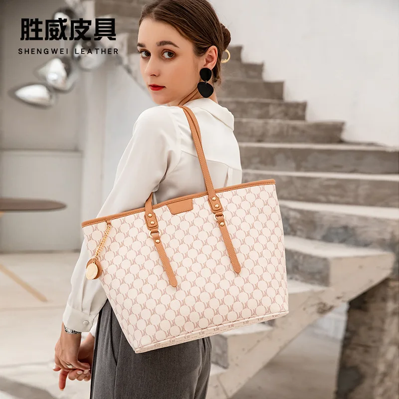European and American bags large-capacity tote bag women's class commuting high-end women's handbag one-shoulder women's bag
European and American bags large-capacity tote bag women's class commuting high-end women's handbag one-shoulder women's bag