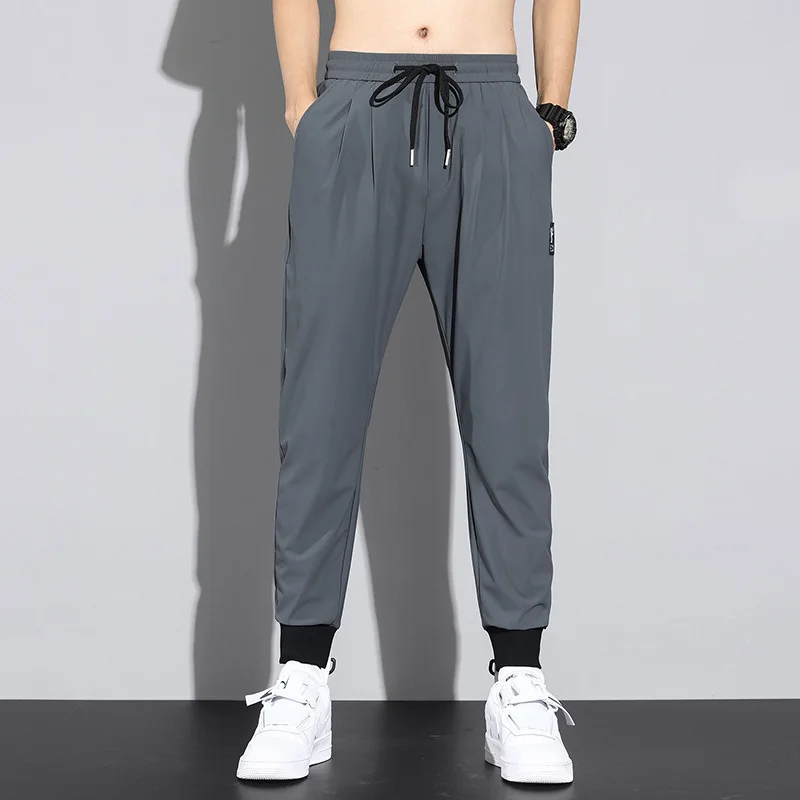 Silk ICE Thin Summer men trousers Loose Korea Clothing Ankle Length jogging pants men Drawstring Sportswear tracksuit joggers
Silk ICE Thin Summer men trousers Loose Korea Clothing Ankle Length jogging pants men Drawstring Sportswear tracksuit joggers