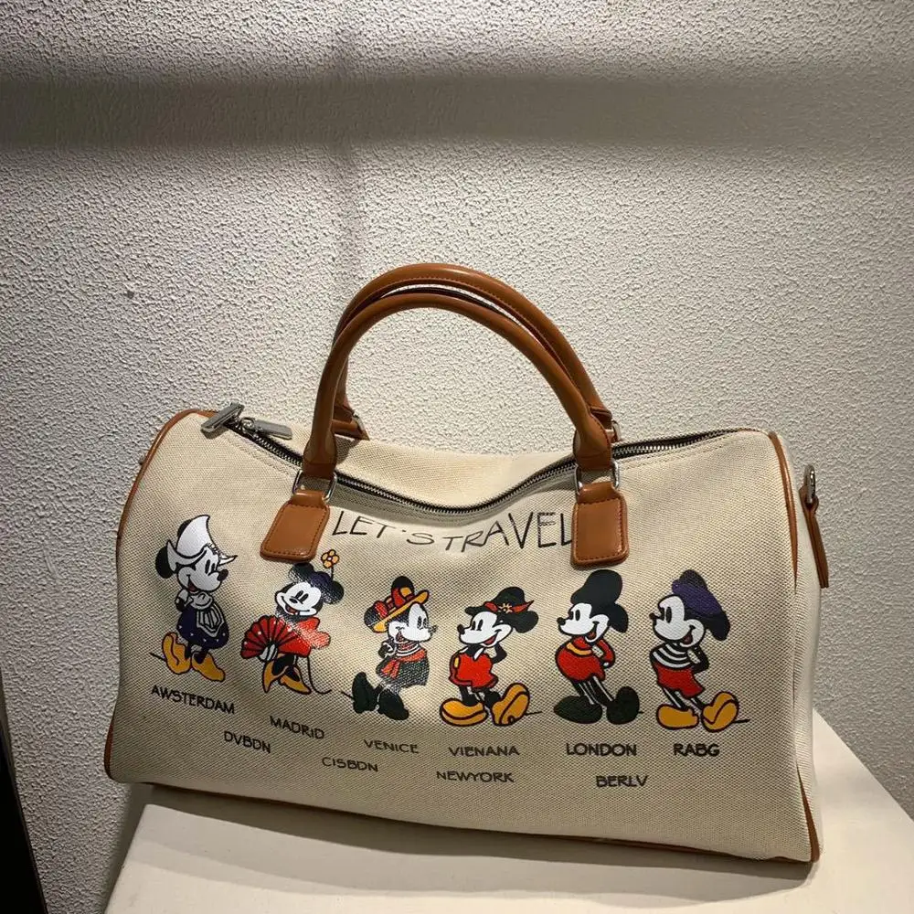 Disney Mickey cartoon canvas handbag Minnie ladies men's messenger bag large capacity shoulder bag
Disney Mickey cartoon canvas handbag Minnie ladies men's messenger bag large capacity shoulder bag