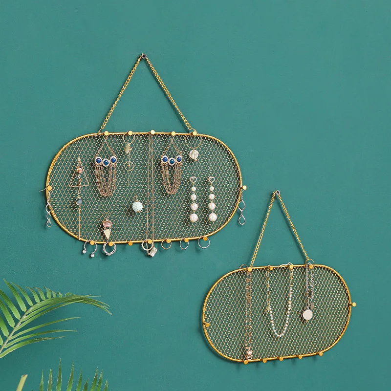 Nordic light luxury wrought iron jewelry rack earrings key storage rack can be hung on the wall jewelry display rack
Nordic light luxury wrought iron jewelry rack earrings key storage rack can be hung on the wall jewelry display rack
