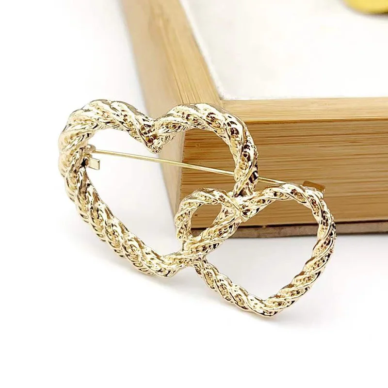 Europe And America Double Layer Metal Love Heart Brooches Anti Slip Bow Pins Lady Sweater Cardigan Buckle Accessories
Europe And America Double Layer Metal Love Heart Brooches Anti Slip Bow Pins Lady Sweater Cardigan Buckle Accessories