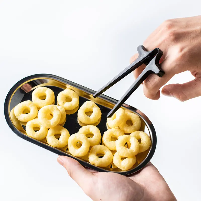 Creative Lazy Assistant Artifact Game Player Finger Chopsticks Portable Clip Snack Potato Chips Salad Simple Non-dirty Hand Tool
Creative Lazy Assistant Artifact Game Player Finger Chopsticks Portable Clip Snack Potato Chips Salad Simple Non-dirty Hand Tool