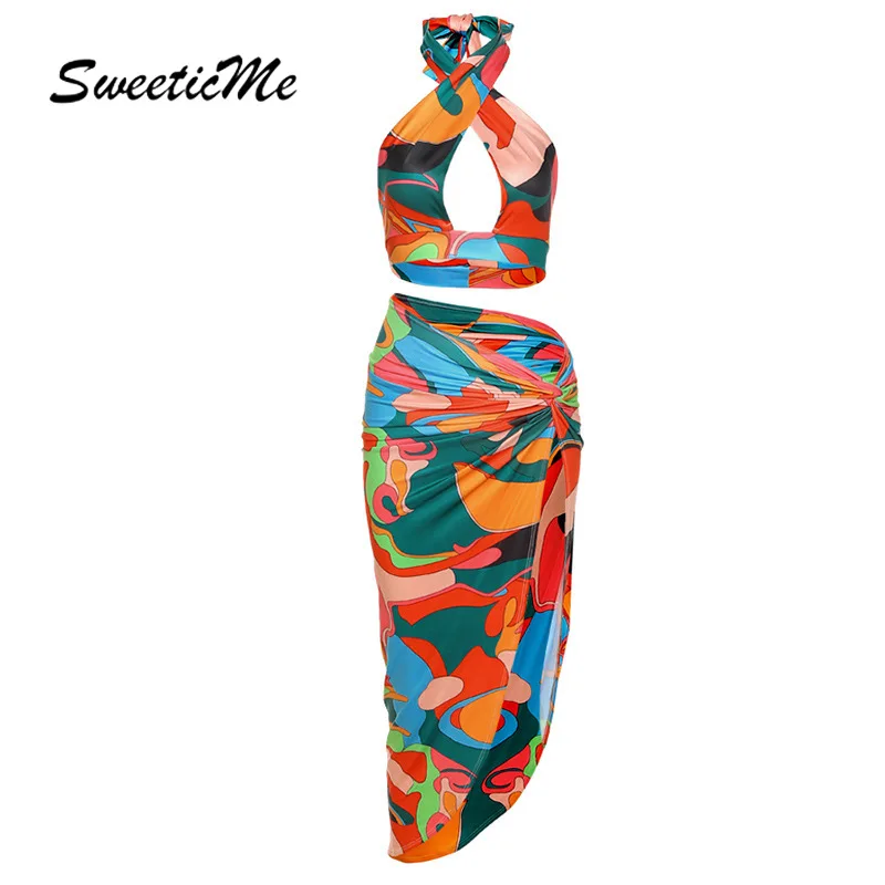 Женский новый костюм SweeticMe с лямкой через шею, ажурный жилет, модная юбка с принтом и разрезом
Женский новый костюм SweeticMe с лямкой через шею, ажурный жилет, модная юбка с принтом и разрезом