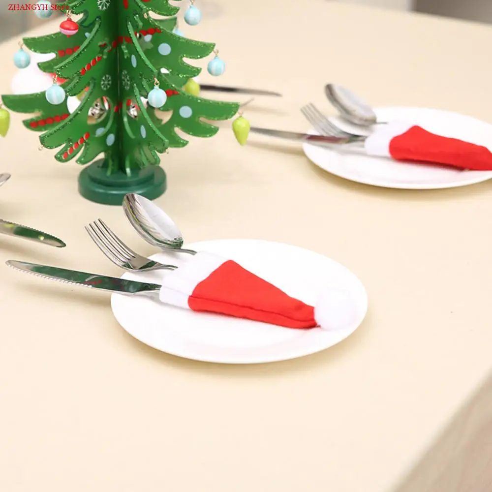 20pcs Merry Christmas Decorative Tableware Fork Set Cute Lovely Xmas Christmas Hat Storage Tool enfeites de natal Gift
20pcs Merry Christmas Decorative Tableware Fork Set Cute Lovely Xmas Christmas Hat Storage Tool enfeites de natal Gift