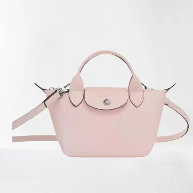 New Longxiang Fashion, Simple and Atmosphere, One Shoulder Handheld Crossbody, Large Capacity Mini Dumplings, Women's Bag
New Longxiang Fashion, Simple and Atmosphere, One Shoulder Handheld Crossbody, Large Capacity Mini Dumplings, Women's Bag