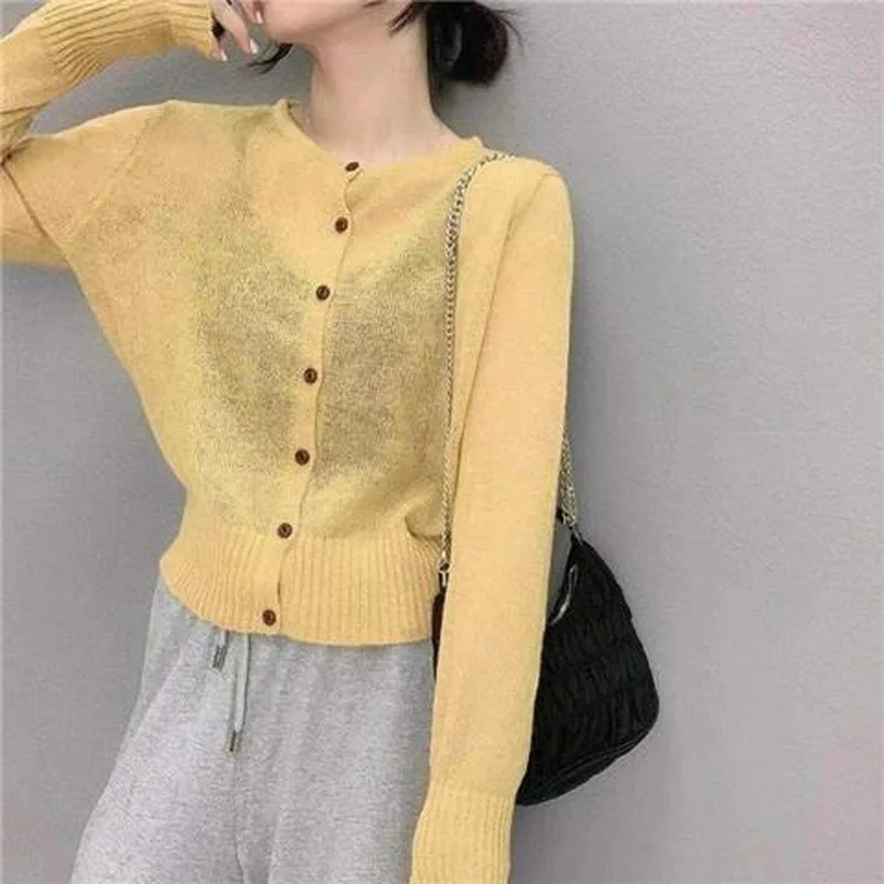2022 Women Shirt Thin See Through Fashion Solid Color Cropped Cardigan Casual Clothing Ice Silk Knitting Cardigans Spring Fall
2022 Women Shirt Thin See Through Fashion Solid Color Cropped Cardigan Casual Clothing Ice Silk Knitting Cardigans Spring Fall
