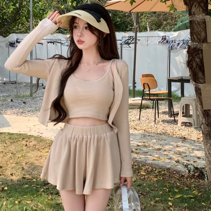 Spring Three Piece Set Women's Long Sleeve Cardigan Coat Short Strap Tank Top Short Skirt Pants Fashion Sports Knit Suit
Spring Three Piece Set Women's Long Sleeve Cardigan Coat Short Strap Tank Top Short Skirt Pants Fashion Sports Knit Suit