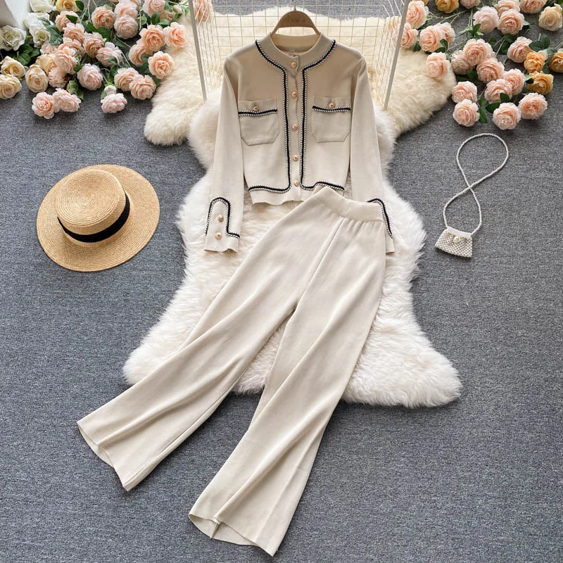 Autumn New Light Mature Wind Knitted Design Sense Single-breasted Cardigan High Waist Thin Wide Leg Pants Two-piece Set
Autumn New Light Mature Wind Knitted Design Sense Single-breasted Cardigan High Waist Thin Wide Leg Pants Two-piece Set