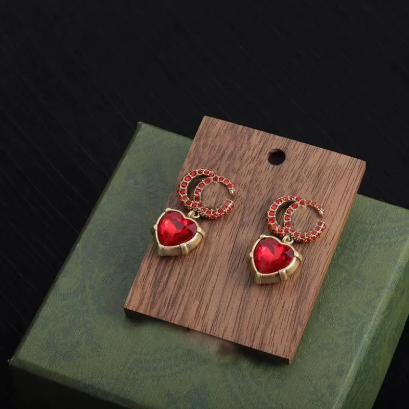 Donia Jewelry Fashion Letters Titanium Steel Micro-Inlaid AAA Zircon Silver Needle Luxury Retro Red Heart Earrings
Donia Jewelry Fashion Letters Titanium Steel Micro-Inlaid AAA Zircon Silver Needle Luxury Retro Red Heart Earrings