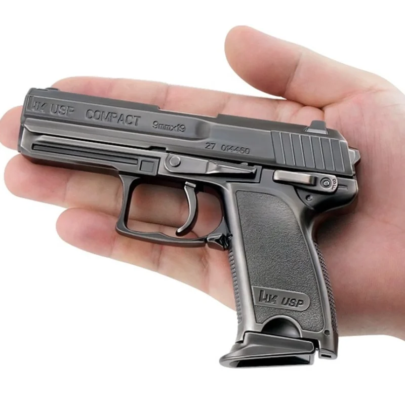 Игрушечный пистолет 1:2, 05 USP, миниатюрная модель Can Shoot, металлический съемный картридж из сплава, чехол для бросания, коллекционный костюм, ре...
Игрушечный пистолет 1:2, 05 USP, миниатюрная модель Can Shoot, металлический съемный картридж из сплава, чехол для бросания, коллекционный костюм, ре...