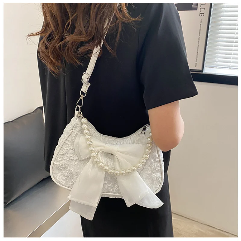 Hot Sale Summer Small Crowd Design Bowknot Underarm Bag Women Fashion Pearl Chain Pleated Portable Shoulder Messenger Bag Female
Hot Sale Summer Small Crowd Design Bowknot Underarm Bag Women Fashion Pearl Chain Pleated Portable Shoulder Messenger Bag Female
