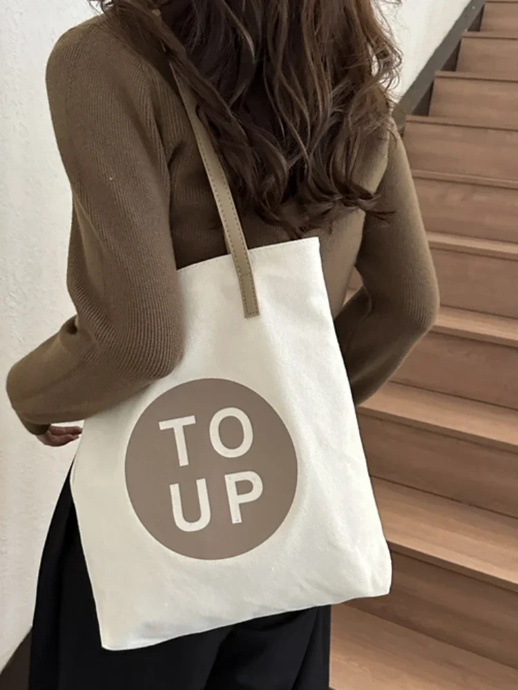 New Japanese style artistic handbag ins simple and large capacity lazy style single shoulder canvas women's bag for students
New Japanese style artistic handbag ins simple and large capacity lazy style single shoulder canvas women's bag for students
