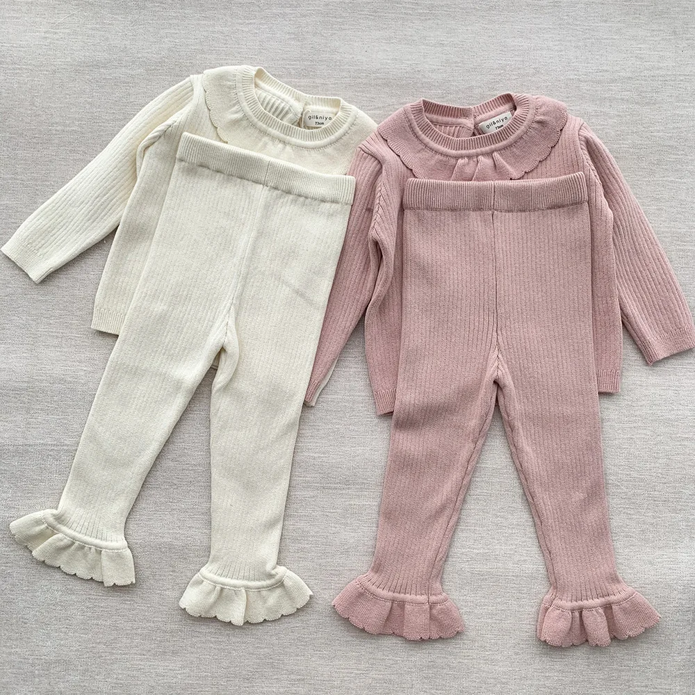 HoneyCherry Autumn and Winter New Girl Baby Knitted Sweater Set Retro Solid Color Ruffle Top + Flared Trousers 2 Pieces Set
HoneyCherry Autumn and Winter New Girl Baby Knitted Sweater Set Retro Solid Color Ruffle Top + Flared Trousers 2 Pieces Set