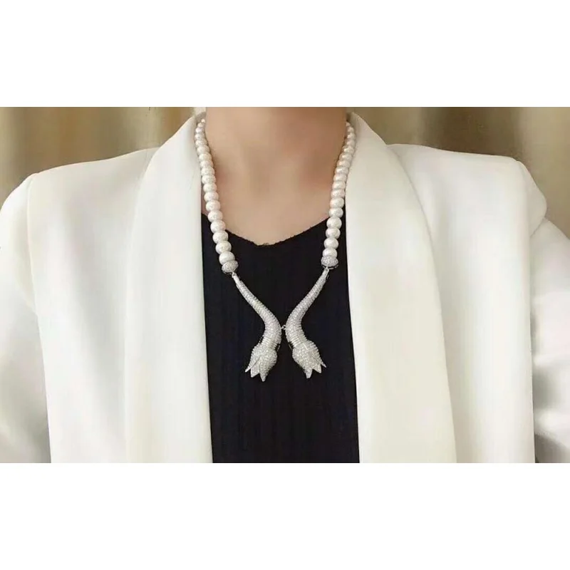 Hand knotted simple noble 10-11mm 70cm white oblate freshwater pearl micro inlay zircon accessories necklace sweater chain
Hand knotted simple noble 10-11mm 70cm white oblate freshwater pearl micro inlay zircon accessories necklace sweater chain