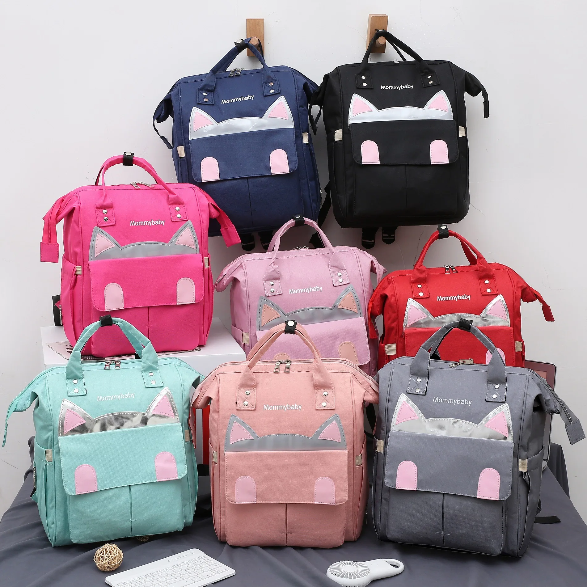 New Large Capacity Cute Cat Mummy Bag Outdoor Leisure Diaper Bag Baby Stroller Accessories Bags Multifunction Backpack
New Large Capacity Cute Cat Mummy Bag Outdoor Leisure Diaper Bag Baby Stroller Accessories Bags Multifunction Backpack