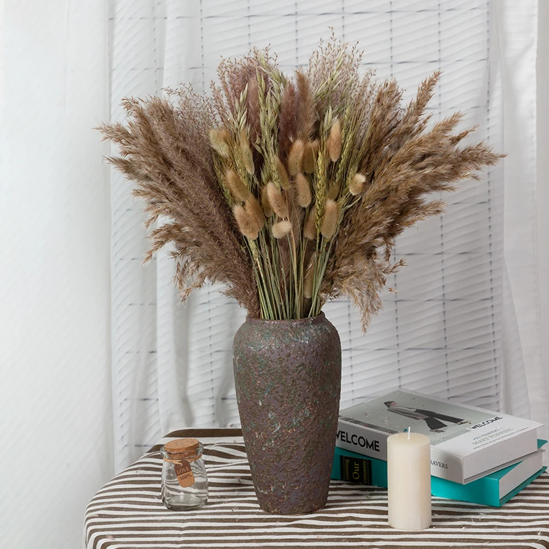 A variety of natural dried pampas reed bouquets Boho home decor flowers wedding accessories random mix and match style
A variety of natural dried pampas reed bouquets Boho home decor flowers wedding accessories random mix and match style