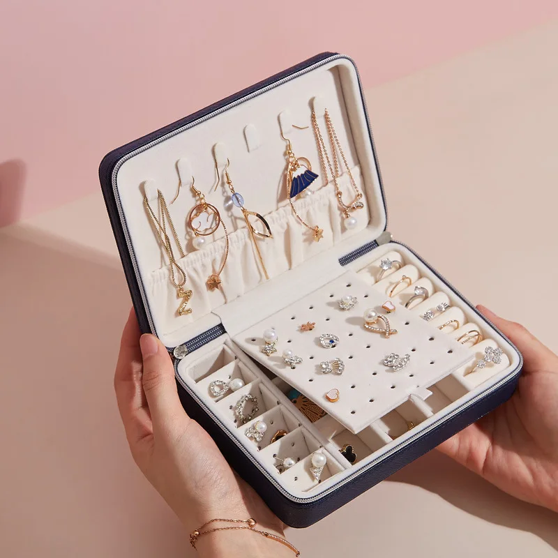 New Portable PU Fresh Simple Earnail Jewelry Box Zipper Earring Ring Multi functional Booth Jewelry Storage Box
New Portable PU Fresh Simple Earnail Jewelry Box Zipper Earring Ring Multi functional Booth Jewelry Storage Box