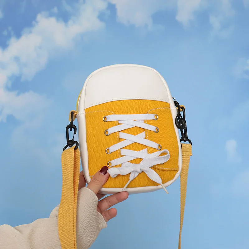 Canvas Messenger Bag Shoulder Messenger Bag Sneakers Stripe Stitching Design Casual School Bag Work Travel Men And Women
Canvas Messenger Bag Shoulder Messenger Bag Sneakers Stripe Stitching Design Casual School Bag Work Travel Men And Women