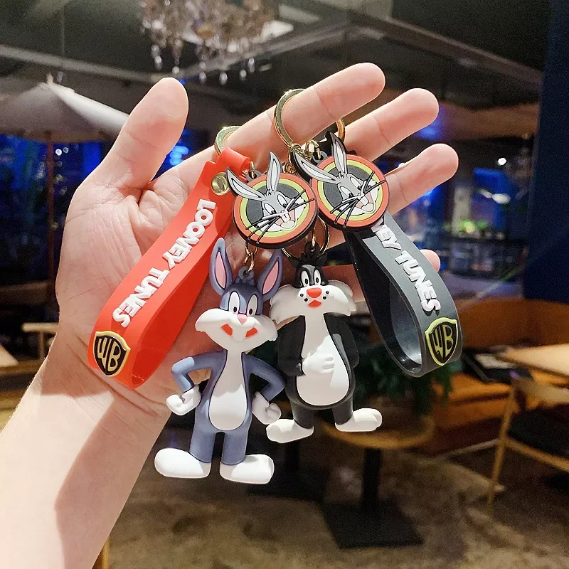 Anime Figure Keychain Bugs Bunny Daffy Duck Cat Bag Key Ring Pendant Accessories Children's Toys Birthday Gifts
Anime Figure Keychain Bugs Bunny Daffy Duck Cat Bag Key Ring Pendant Accessories Children's Toys Birthday Gifts