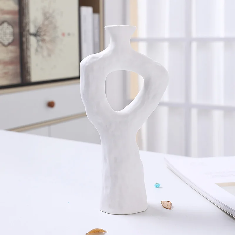 White Ceramic Vase Nordic Openwork Vase Home Decor Room Decoration Candle Holder Flower Pot Decoration Desktop Art Ornament
White Ceramic Vase Nordic Openwork Vase Home Decor Room Decoration Candle Holder Flower Pot Decoration Desktop Art Ornament