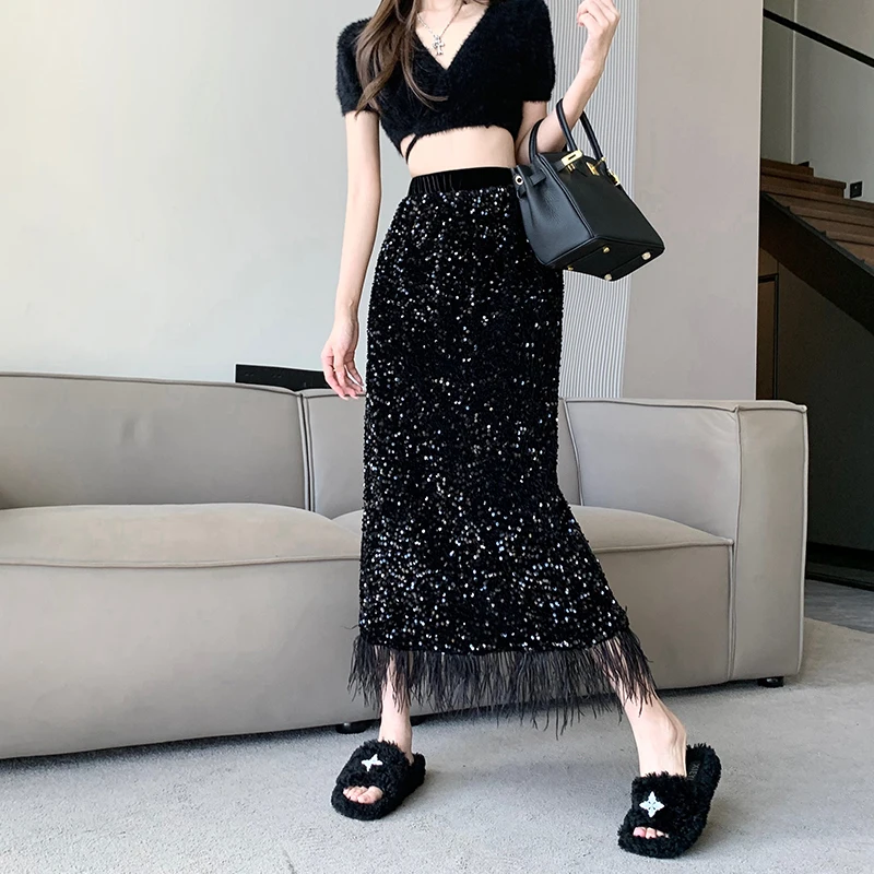 Черная юбка с блестками и страусиным мехом для женщин на весну и осень средней длины с высокой талией сексуальные юбки с разрезом и бахромой
Черная юбка с блестками и страусиным мехом для женщин на весну и осень средней длины с высокой талией сексуальные юбки с разрезом и бахромой