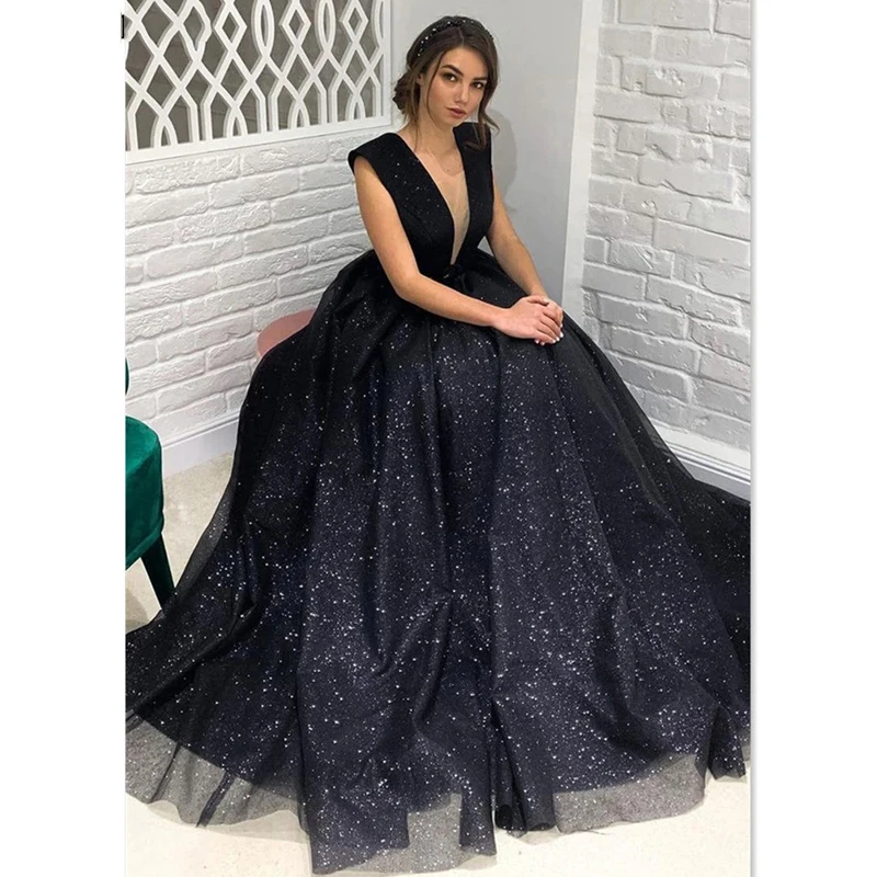 Black Glitter A-line Evening Dress Sexy Open Back Prom Dress 2023 Shiny Deep V-neck Party Dress Shiny فساتين مناسبة رسمية
Black Glitter A-line Evening Dress Sexy Open Back Prom Dress 2023 Shiny Deep V-neck Party Dress Shiny فساتين مناسبة رسمية