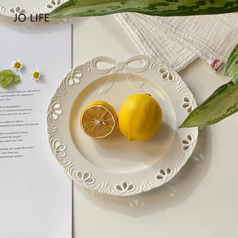 JO LIFE French Relief Sculpture Dessert Salad Dish Ceramic Elegant Bow Tie Hollowed Bowknot Plate Dishes Kitchen Tableware Plate 
JO LIFE French Relief Sculpture Dessert Salad Dish Ceramic Elegant Bow Tie Hollowed Bowknot Plate Dishes Kitchen Tableware Plate