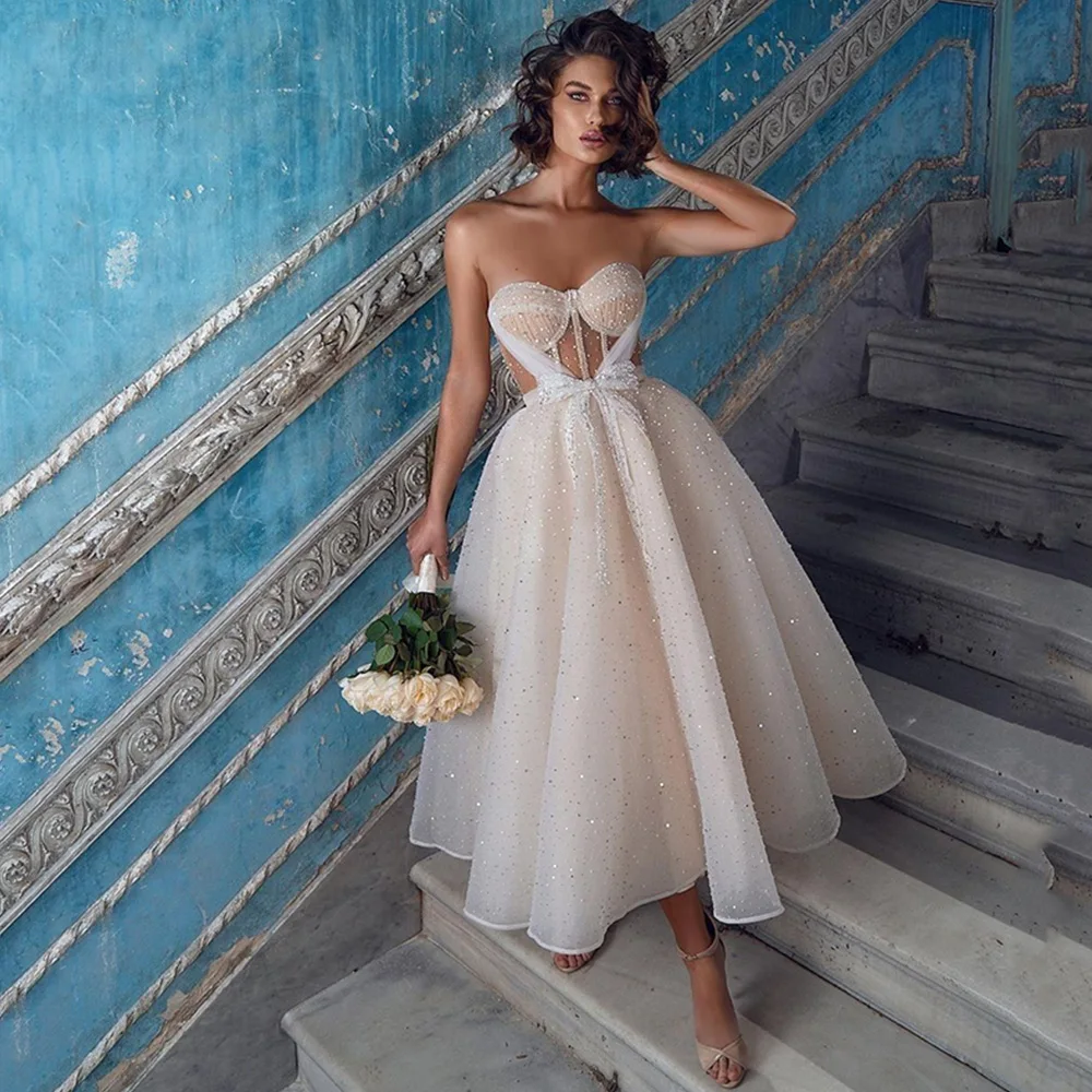 Изысканные блестящие свадебные платья, милое Тюлевое платье без рукавов, ТРАПЕЦИЕВИДНОЕ ПЛАТЬЕ до середины икры с бантом и блестками, сваде... 
Изысканные блестящие свадебные платья, милое Тюлевое платье без рукавов, ТРАПЕЦИЕВИДНОЕ ПЛАТЬЕ до середины икры с бантом и блестками, сваде...