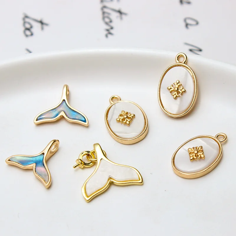 1pcs Diy Accessories Copper Gold Plated Shell Disc Size Fishtail Pearl Holder Pendant Earrings Materials Handmade Charms
1pcs Diy Accessories Copper Gold Plated Shell Disc Size Fishtail Pearl Holder Pendant Earrings Materials Handmade Charms