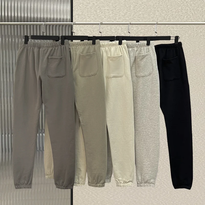 Brand jogging Fw21 pants ESSENTIALS Sports Pants Jerry Lorenzo printed Reflective letters Hip hop Loose Unisex Cotton Sweatpant
Brand jogging Fw21 pants ESSENTIALS Sports Pants Jerry Lorenzo printed Reflective letters Hip hop Loose Unisex Cotton Sweatpant