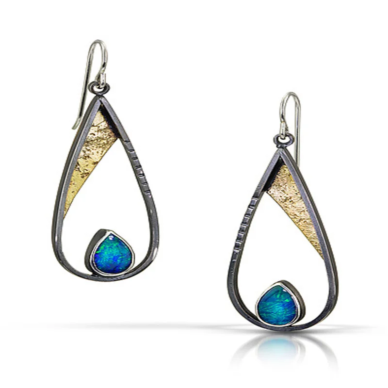 Retro Alloy Earrings Women's Long Water Drop Turquoise National Wind Earrings European and American Popular Ear Hook Jewelry
Retro Alloy Earrings Women's Long Water Drop Turquoise National Wind Earrings European and American Popular Ear Hook Jewelry
