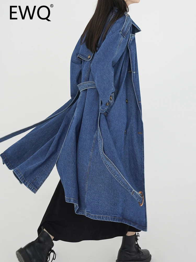EWQ Fashion Belt Design Denim Long Trench For Women Solid Lapel Double Breasted Tide Female Overcoat 2023 Autumn New 26D4716
EWQ Fashion Belt Design Denim Long Trench For Women Solid Lapel Double Breasted Tide Female Overcoat 2023 Autumn New 26D4716