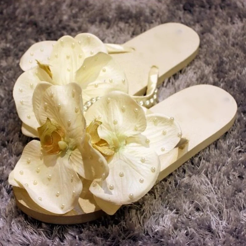 White Flower String Bead Flat Slippers Clip Toe Rubber Sole Pearl Strap Summer Beach Slippers Leisure Outdoor Slides
White Flower String Bead Flat Slippers Clip Toe Rubber Sole Pearl Strap Summer Beach Slippers Leisure Outdoor Slides