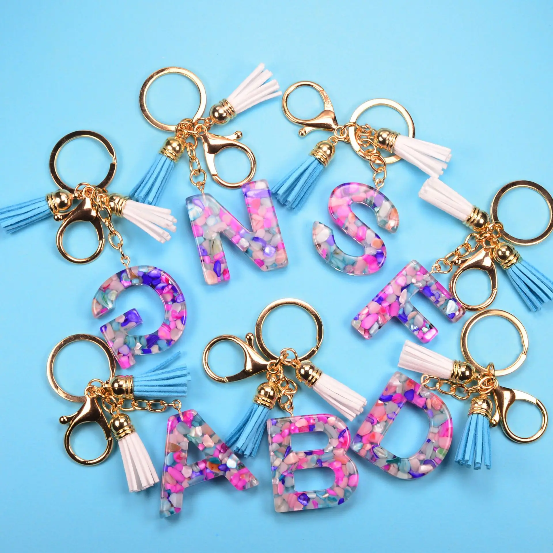 New Resin Dainty Tassel 26 Letters Keychain Charms Accessories For Women Handbag Ornaments Keyrings Fashion Jewelry Gifts
New Resin Dainty Tassel 26 Letters Keychain Charms Accessories For Women Handbag Ornaments Keyrings Fashion Jewelry Gifts