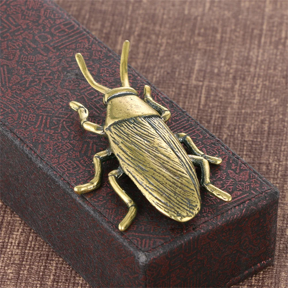 1PC Pure Copper Insect Cockroach Miniatures Figurines Solid Brass Craft Ornament Home Office Collection Craft Desktop Decoration
1PC Pure Copper Insect Cockroach Miniatures Figurines Solid Brass Craft Ornament Home Office Collection Craft Desktop Decoration