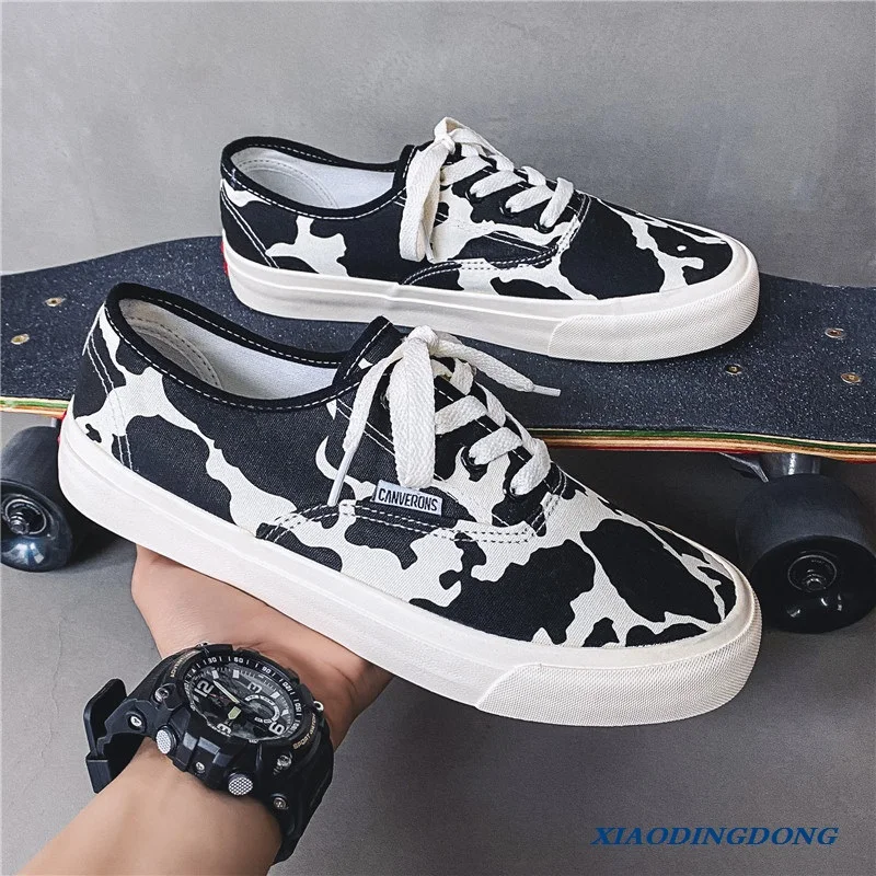 Fashion Cow Print Canvas Shoes Sneakers Men Casual Vulcanized Shoes Wear-resisting Animal Printed Plimsolls Man Skateboard Shoes
Fashion Cow Print Canvas Shoes Sneakers Men Casual Vulcanized Shoes Wear-resisting Animal Printed Plimsolls Man Skateboard Shoes