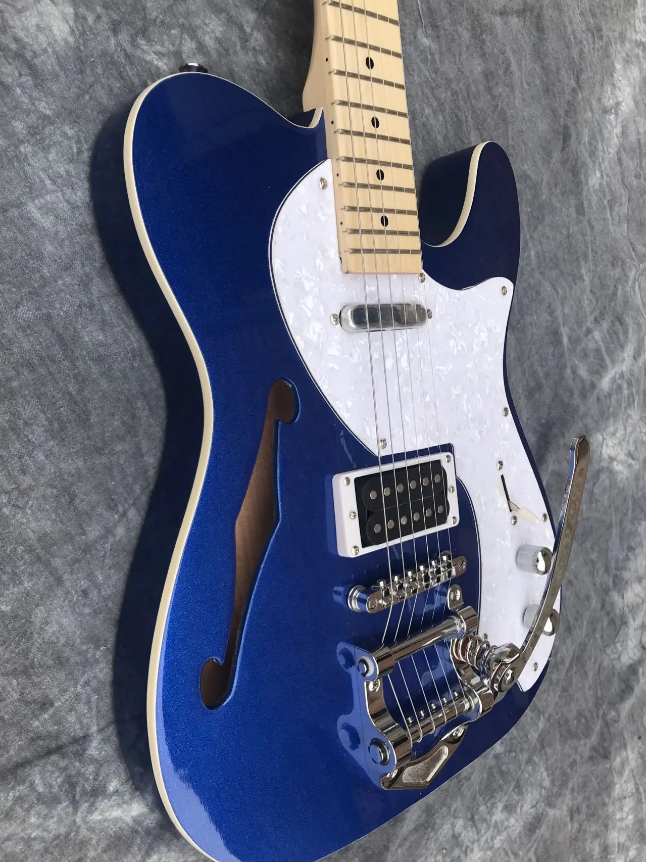 Oem 6 String TL Jazz Electric Guitar Semi-Hollow Body Glossy Finish Building Cream Tremelo,Color Blue,Free Delivery
Oem 6 String TL Jazz Electric Guitar Semi-Hollow Body Glossy Finish Building Cream Tremelo,Color Blue,Free Delivery