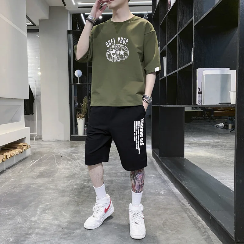 Summer suit men's wear a set with handsome fashion short sleeved T-shirt fashion brand sports loose upper clothes
Summer suit men's wear a set with handsome fashion short sleeved T-shirt fashion brand sports loose upper clothes
