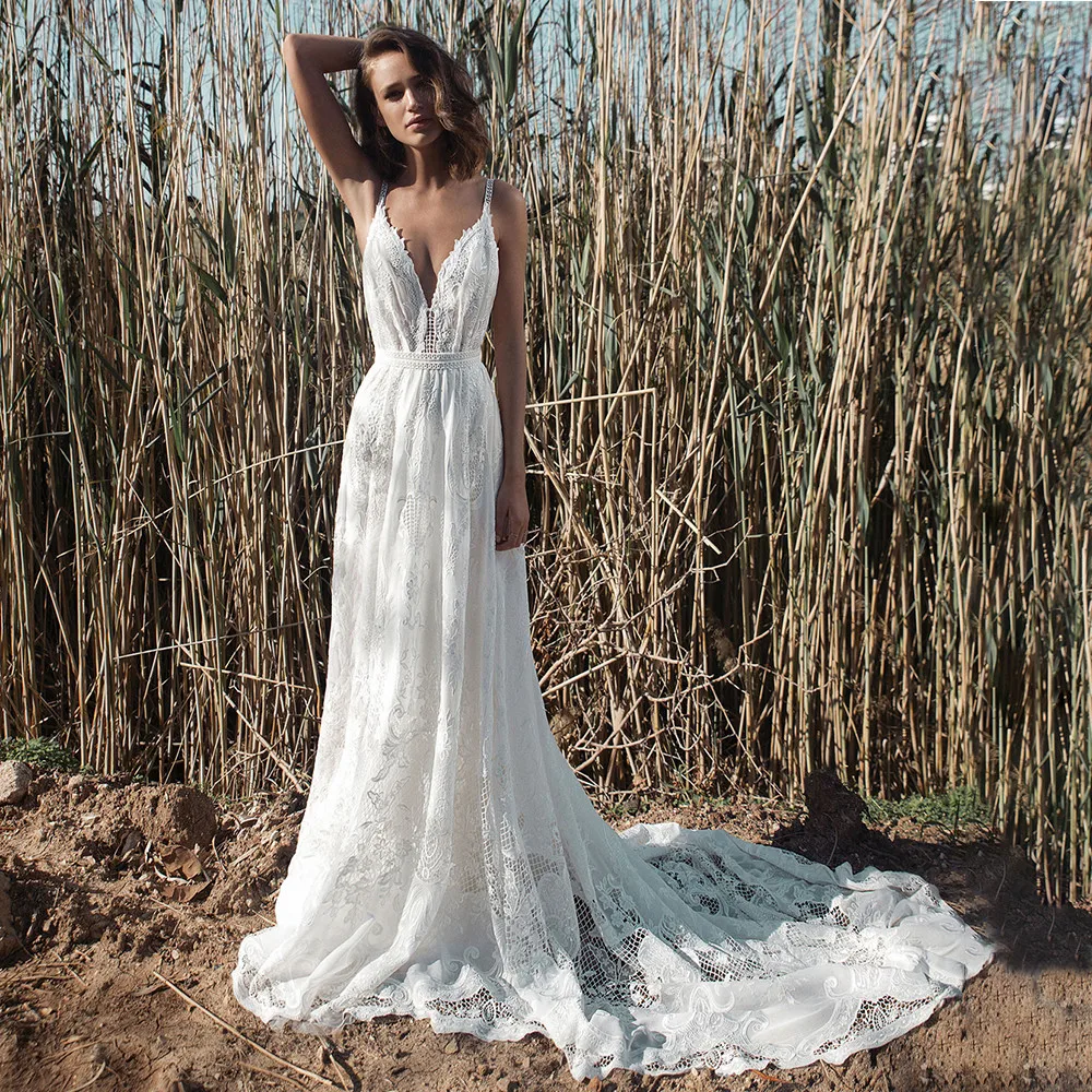 Bohemian Lace Wedding Dresses Spaghetti Straps Appliques Backless Sexy Deep V Neck Bridal Gowns Robe De Mariée Court Train 
Bohemian Lace Wedding Dresses Spaghetti Straps Appliques Backless Sexy Deep V Neck Bridal Gowns Robe De Mariée Court Train
