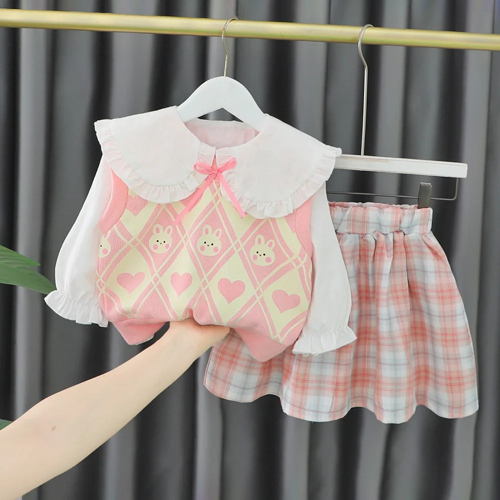 New girls' knitted vest, college style shirt, plaid skirt, three-piece girls' autumn suit girl clothes girl outfit set
New girls' knitted vest, college style shirt, plaid skirt, three-piece girls' autumn suit girl clothes girl outfit set
