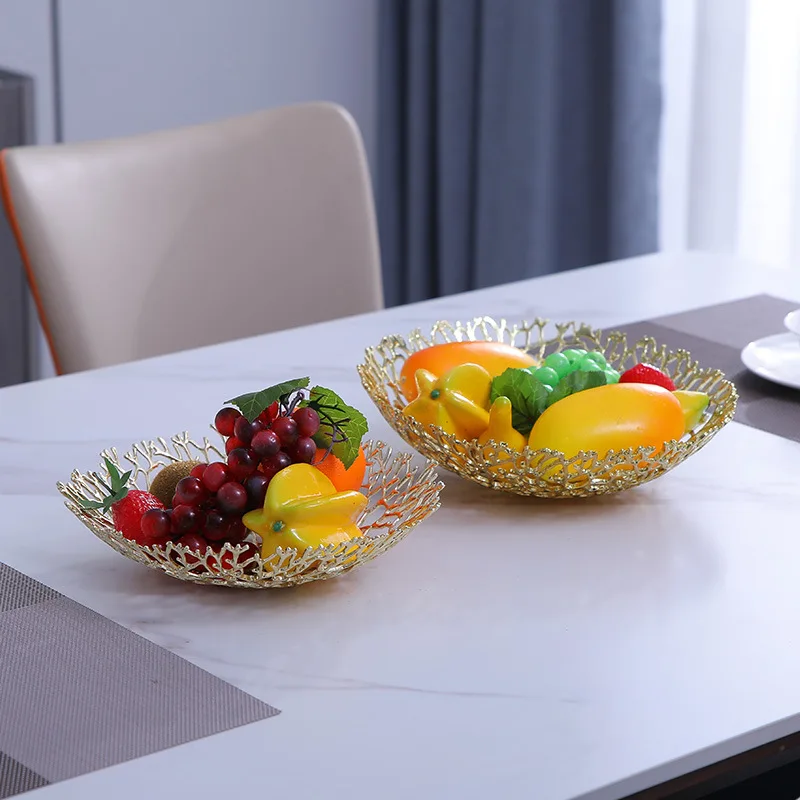 Hollowed out alloy fruit tray modern simple living room household dining table decoration fruit tray storage model room light
Hollowed out alloy fruit tray modern simple living room household dining table decoration fruit tray storage model room light