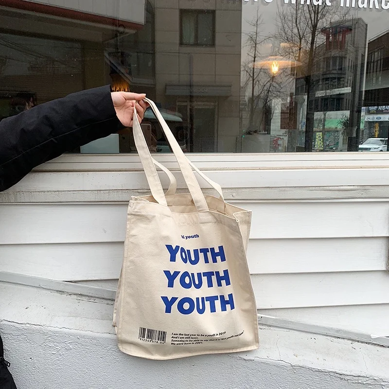 Women Canvas Shopping Bag YOUTH Letters Print Female Cotton Cloth Shoulder Bag Eco Handbag Tote Reusable Grocery Shopper Bags
Women Canvas Shopping Bag YOUTH Letters Print Female Cotton Cloth Shoulder Bag Eco Handbag Tote Reusable Grocery Shopper Bags