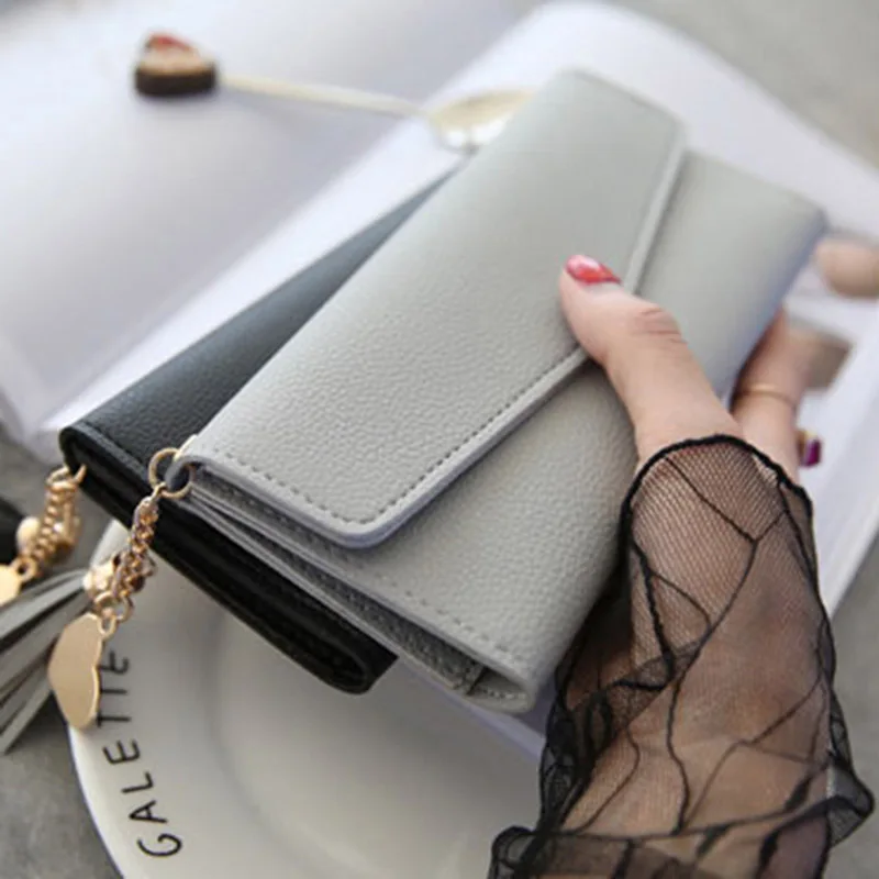 Brand Designer Coin Purses Leather Wallets Women Long Tassel Luxury Clutch Phone Wallets Female Credit Card Holder Money Bags
Brand Designer Coin Purses Leather Wallets Women Long Tassel Luxury Clutch Phone Wallets Female Credit Card Holder Money Bags