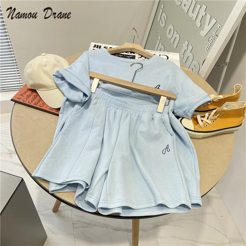 Sports Suit Women 2022 Summer Loose Letter Embroidered Short Sleeve T-shirt + High Waist Slim Shorts Casual Two-piece Set
Sports Suit Women 2022 Summer Loose Letter Embroidered Short Sleeve T-shirt + High Waist Slim Shorts Casual Two-piece Set