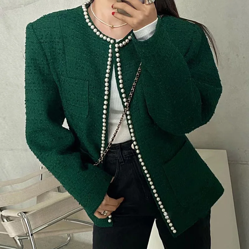 Retro autumn o-neck heavy industry beading tweed jacket women loose long-sleeved multi-pocket woolen short outwear
Retro autumn o-neck heavy industry beading tweed jacket women loose long-sleeved multi-pocket woolen short outwear