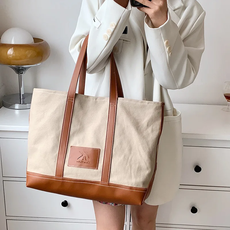 Fashion Canvas Women Tote Bag 2022 Large Lady Handbag Simple Casual Shopping Bag Brand Designer Women Commuter Shoulder Bag
Fashion Canvas Women Tote Bag 2022 Large Lady Handbag Simple Casual Shopping Bag Brand Designer Women Commuter Shoulder Bag