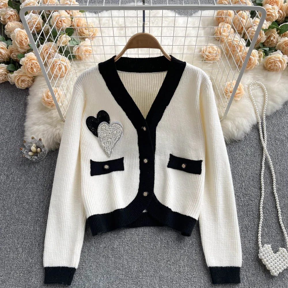 Вязаный кардиган VANOVICH контрастных цветов с V-образным вырезом и жемчужинами, короткое пальто, осенняя женская Свободная Повседневная винта...
Вязаный кардиган VANOVICH контрастных цветов с V-образным вырезом и жемчужинами, короткое пальто, осенняя женская Свободная Повседневная винта...