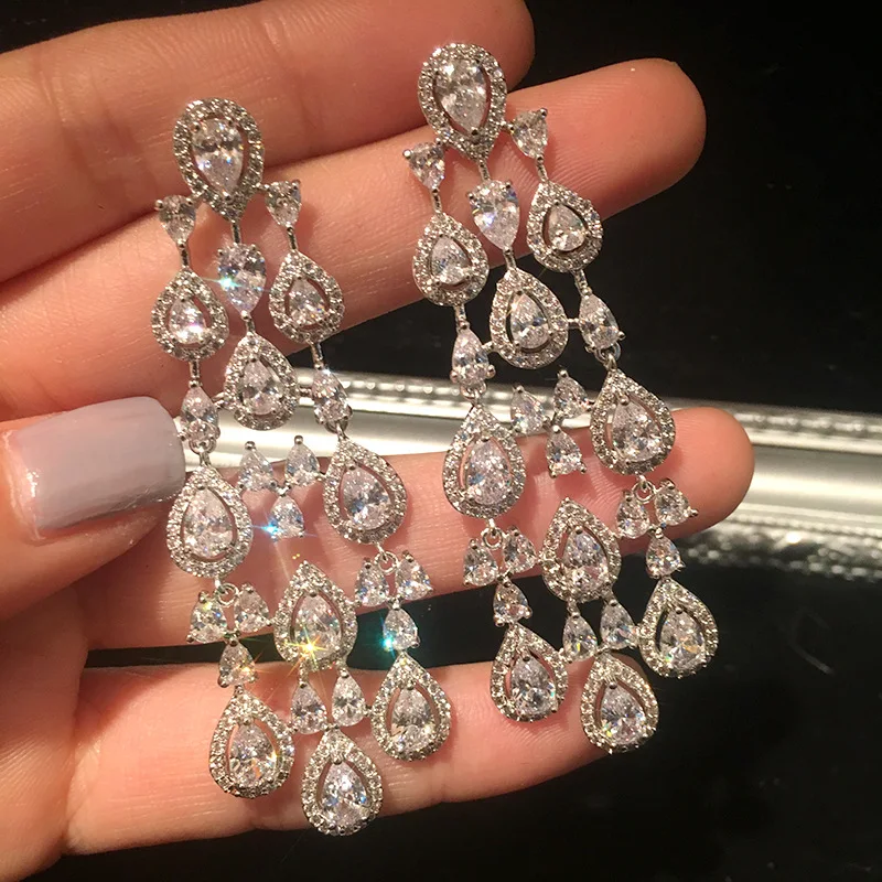 Korean water drop long zircon women's luxury banquet dinner super flash bridal earrings wedding sparkling fine jewelry
Korean water drop long zircon women's luxury banquet dinner super flash bridal earrings wedding sparkling fine jewelry